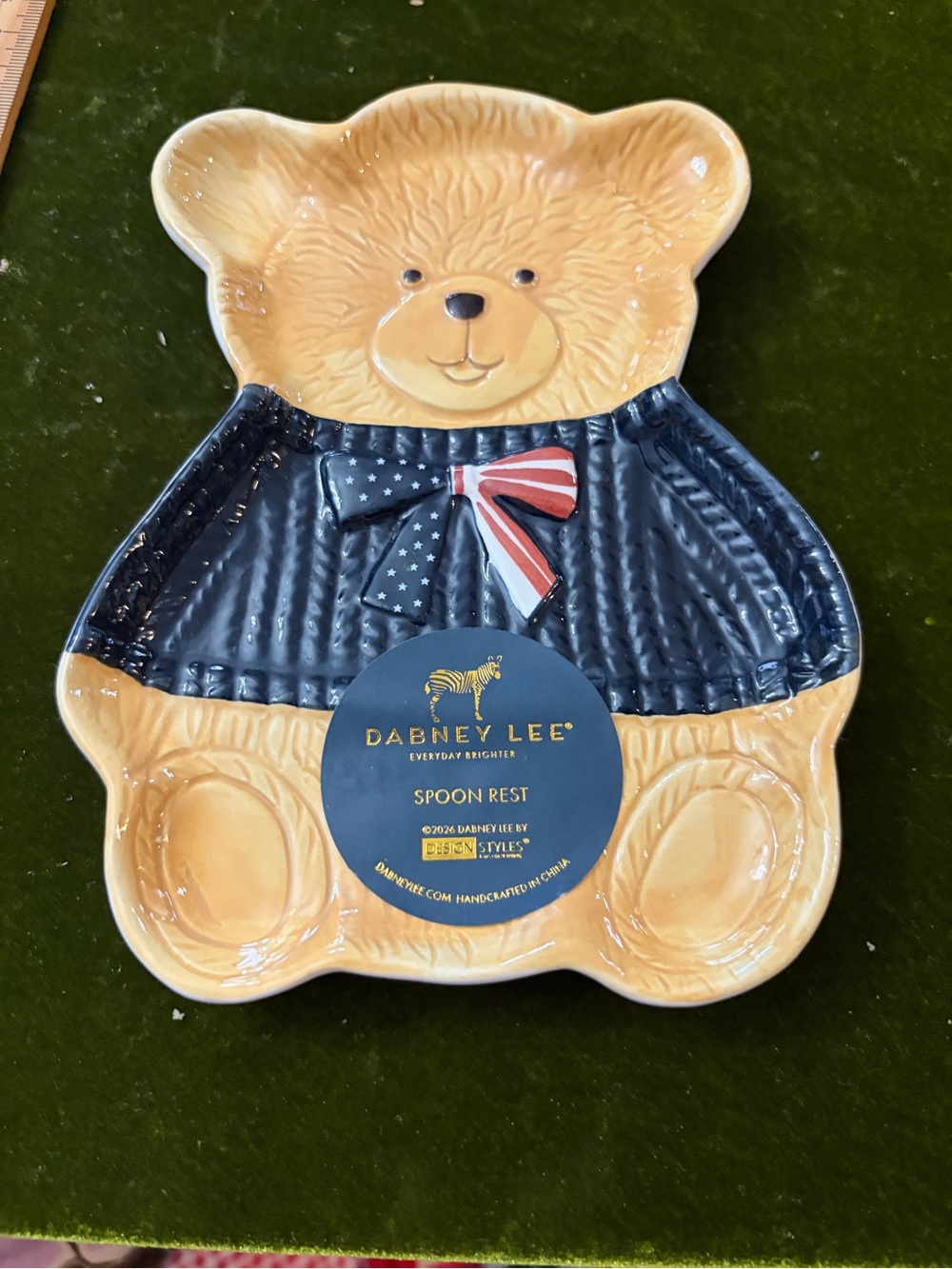 Dabney Lee Yellow Bear Spoon Rest with Navy Sweater and Red-White Bow